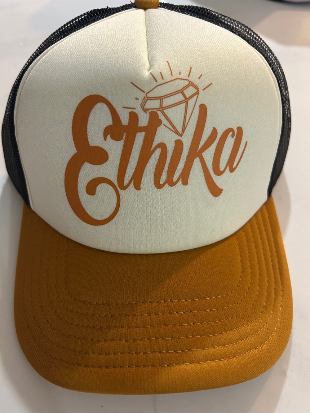 ethika women Trucker Cap in Cream and Mustard